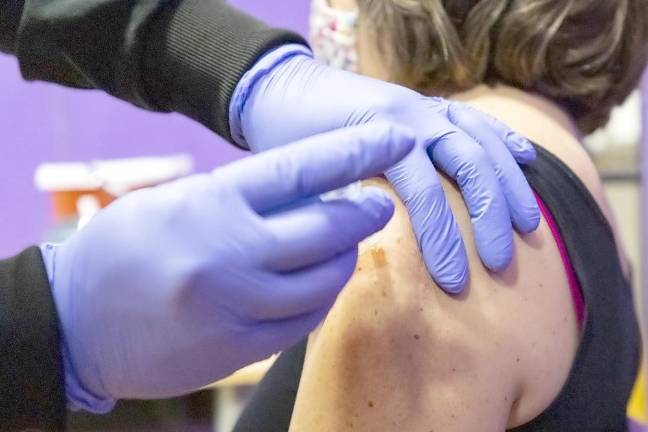 A WVCSD employee receives a COVID-19 vaccination on Sunday, Feb. 28.