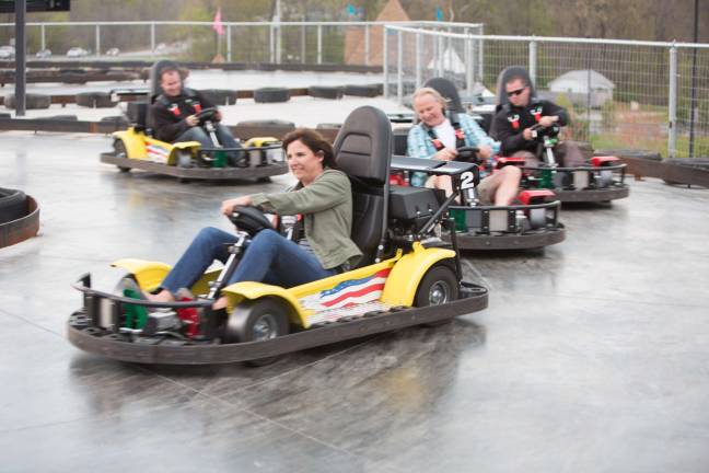 The Castle announces grand opening of third go kart track The Castle Fun Center owners, Brian (center) and Alison Leentjes, taking a spin on their new slick track. Grand opening of their third go kart track is set for Friday, June 13.