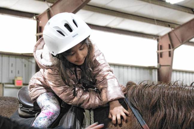 Students also learn how to make treats for the horses.