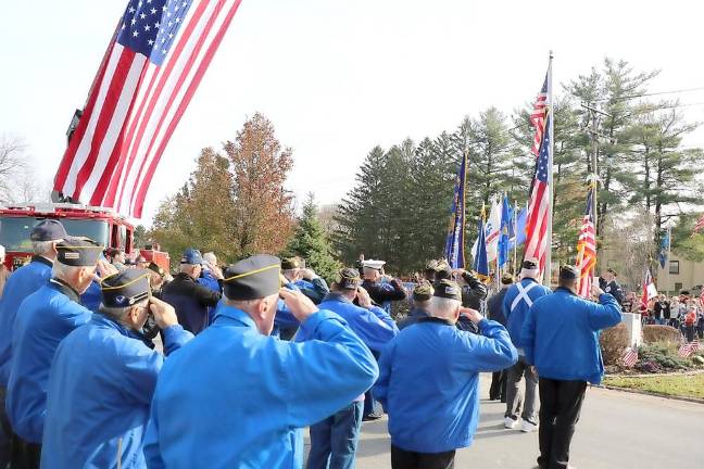 The year in review Pledge of allegiance during Memorial Day services.