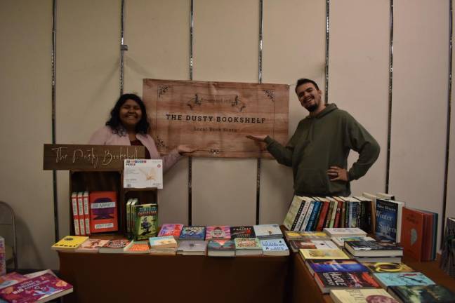 A new generation of indie bookstores – and readers – emerges post-pandemic Veronica and A.J. Siehin set up their pop-up book shop at the Newburgh Mall Holiday Market on Sat. Nov. 19.
