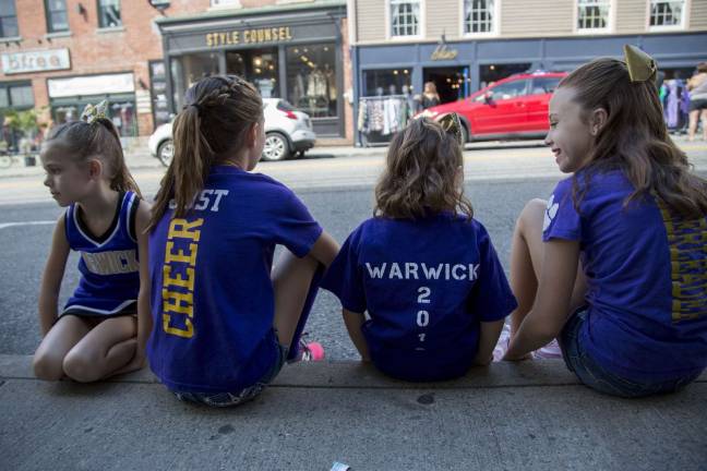 Crowds enjoy Homecoming Day Parade on Main Street Photo by Lisa Ramirez Part of the homecoming crowd now, it will be their turn soon enogh.