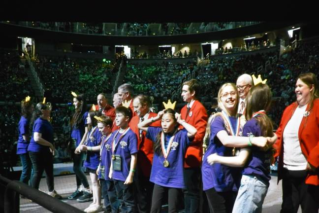 Warwick Middle School wins Odyssey of Mind world championships Warwick Middle School fifth-graders receive their gold medals at the Odyssey of the Mind closing ceremony at Michigan State University May 24. From left: coaches Donna Denny and Rekha Woods, fifth-graders Verdigris Bisla, Molly Cook, Isaac Spicehandler, James Chavez-Carey, Mila Chan, Hailey Troy, Eliza Serafin.