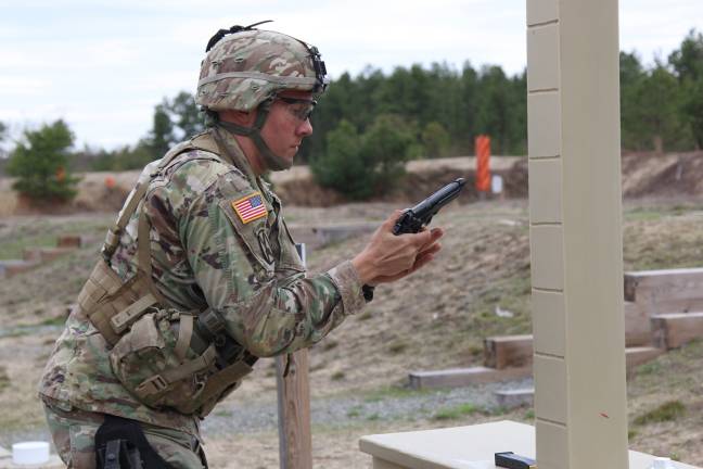 Greenwood Lake resident is one of New York Army National Guard’s best warriors New York Army National Guard Sgt. First Class Martin Cozens, an infantryman assigned to Alpha Co., 2nd Battalion, 108th Infantry Regiment, 27th Infantry Brigade Combat Team, loads an M9 during the pistol qualification portion of the Regional Best Warrior Competition for six states in the North East.