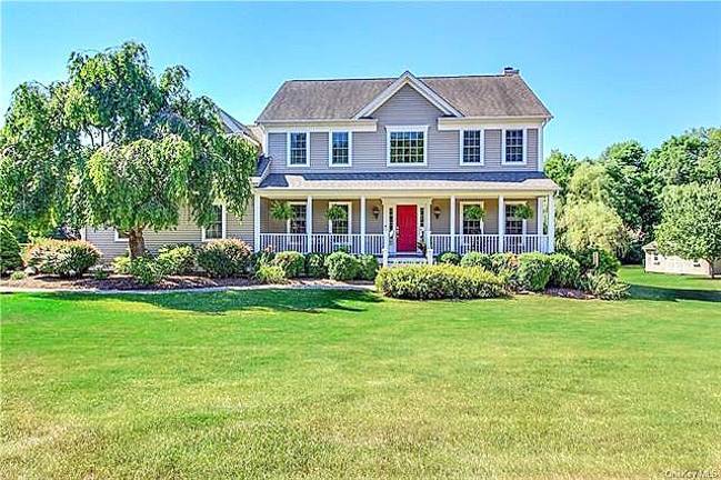 Cul-de-sac stylishly kept house with pool in appealing Warwick neighborhood