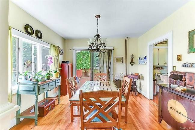 Charm and village convenience with quiet patio over fenced yard Charm and village convenience with quiet patio over fenced yard