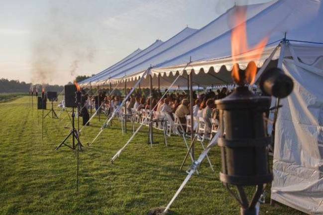 Tickets for fifth annual Black Dirt Feast go on sale June 1 Photo by Robert G. Breese Tickets for the Black Dirt Feast to be held on Aug. 6 go on sale June 1. The annual al fresco fund raiser is held each year by the Pine Island Chamber of Commerce on the fields of Scheuermannís Farm & Greenhouses.