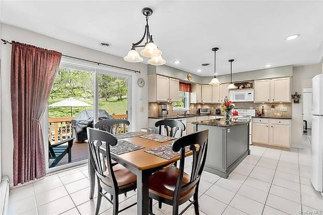 Five acres. Four bedrooms. Rocking chair front porch. Five acres. Four bedrooms. Rocking chair front porch.