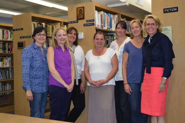 Catholic schools region hosting first 5K run/walk Organizers for the Catholic School 5K Run/Walk gathered for a planning session for the June 14 race.