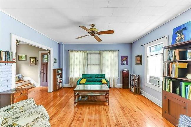 Charm and village convenience with quiet patio over fenced yard Charm and village convenience with quiet patio over fenced yard