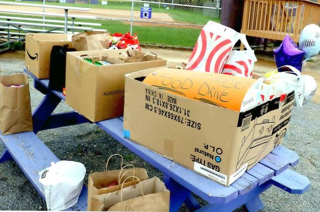 During opening day the League sponsored a non-perishable food donation for the Warwick Ecumenical Food Pantry.