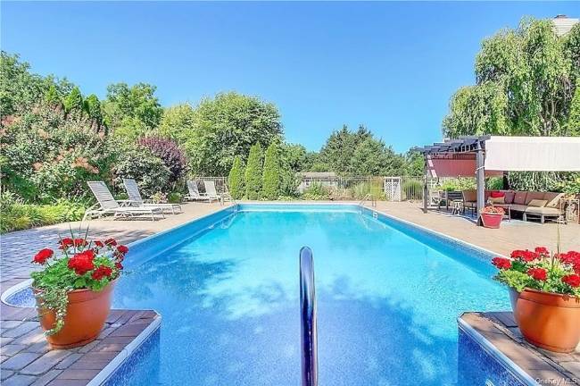 Cul-de-sac stylishly kept house with pool in appealing Warwick neighborhood