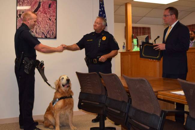 Village of Greenwood Lake honors a furry hero Photo by A.J. Arias Mayor Jesse Dwyer and Village of Greenwood Lake honored Village Police Officer Michael Dunlop and his K-9 partner Vaughn on Monday, May 21, with a certificate of appreciation for their work in the community. Vaughn retiring.