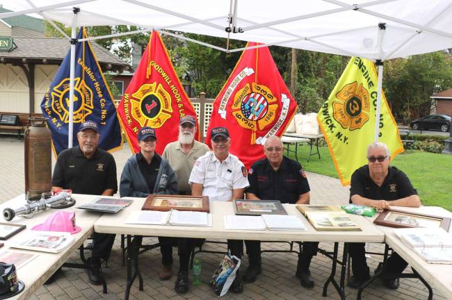 During First Responders Day, members of the Warwick Fire Department manned an exhibit portraying the history of the pepartment. Like the Village this year, the Warwick Fire Department will celebrate its own Sesquicentennial or 150th anniversary in 2019.The public is invited to a history of the Department presentation in the Albert Wisner Public Library on Sunday, Dec. 10. From left, Frank Fotino, Mary Ann Petersen, Brian Wood, Tom Gove, Charlie Niemann and Buzz Joslyn.