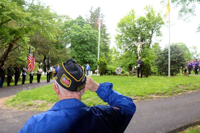 The tradition continues Services at St. Stephen’s Cemetery were conducted by the Rev. Jack Arlotta, pastor of the Church of St. Stephen, the First Martyr.