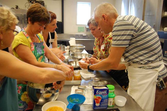 Sharing the secrets of 'putting food up' Participants train to be master food preservers. A three-day workshop is being held in June.
