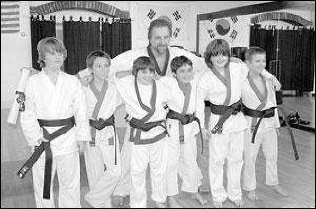 Seven Stars awards black belts: Seven Stars awards black belts: