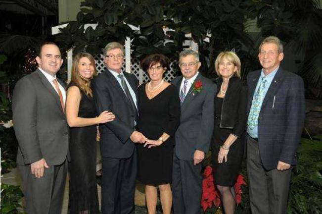 Occupations honors community leaders at gala William Kaplan, third from left, with daughters Joan (to his right) and Sheila (to his left). The Kaplan Family Charitable Foundations was one of six community leaders honored at the Occupations Foundation 2013 Gala on Dec. 7.