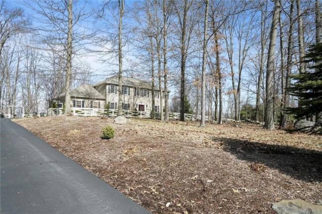 Call this four-bedroom Colonial home