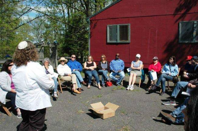 Temple celebrates joyous Lag B'Omer holiday Photos courtesy Gail Conklin Rabbi Rebecca Shinder of Temple Beth Shalom in Florida, leads a group study.