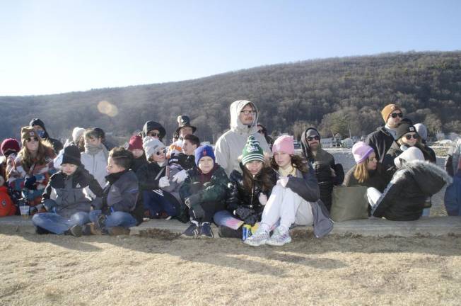 Thousands frolicked, some swam, at wintery carnival