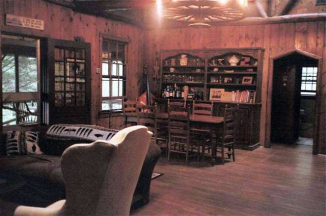 This wonderful property includes a pond, woods, waterfall, stream and three homes This wonderful property includes a pond, woods, waterfall, stream and three homes