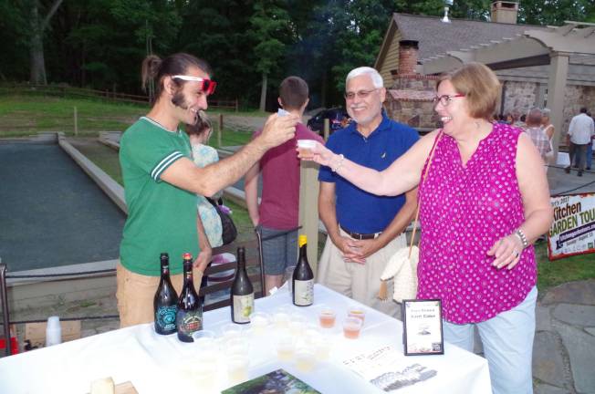 Small event, big impact Attendees toasting at last year's Kitchen Garden Tour after party at Mohawk House.