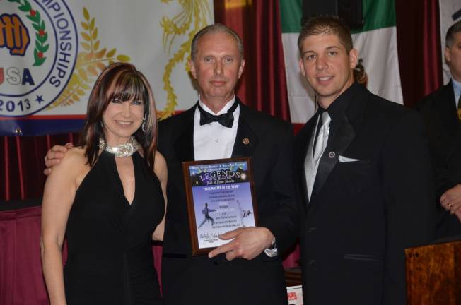 Doug Cook named 2013 Taekwondo Master of the Year Grandmasters Cynthia Rothrock, left, and Eric Kovaleski flank Doug Cook, head instructor of the Chosun Taekwondo Academy in Warwick after Cook was inducted recently into the Legends of the Martial Arts Hall of Fame as its 2013 Taekwondo Master of the Year.