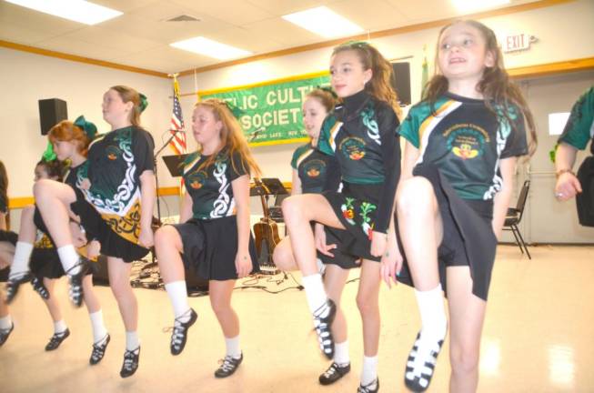 Children of varying ages from the Sheahan-Gormley School of Irish Dance perform at the event.