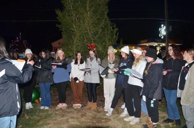 Warwick Valley High School Choral sings Christmas carols during the tree lighting ceremony.