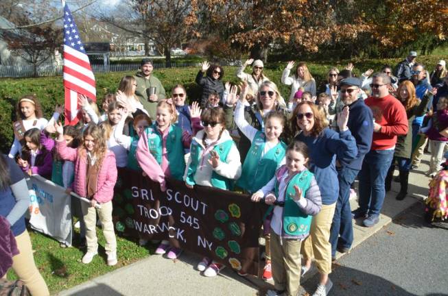 Warwick Girl Scout Troop 545 lines up alongside other community members for the parade.