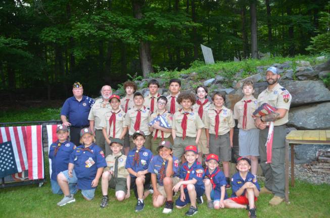 Flag retirement ceremony Greenwood Lake American Legion CDR Vincent Hallinan (top left), with GWL Boy Scout Troop 121 and Cub Scout Troop 121 at a flag retirement ceremony on June 12, 2025.