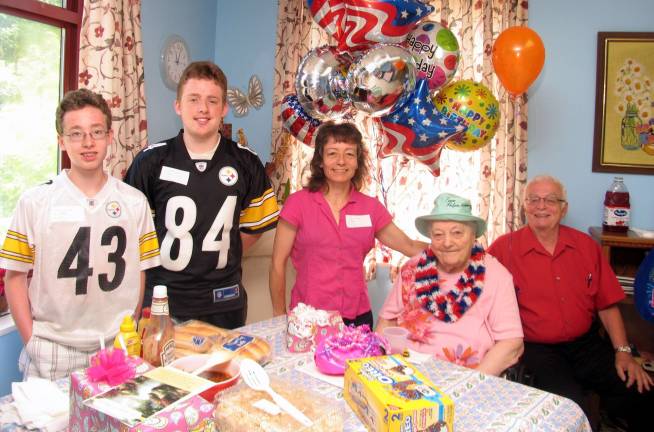 Erna Freisinger celebrates 100th birthday On July 4, Erna Freisinger celebrated her 100th birthday with members of her family at her residence in Schervier Pavilion. From left, great grandsons Matthew and Timothy Mullhaupt, granddaughter Patricia Mullhaupt, Ernestine ìErnaî Freisinger and her son Dr. Gerard Freisinger. Not present for the family photograph: Granddaughter Suzanne SoulÈ and her three children: Sam, Maggie and Carson.