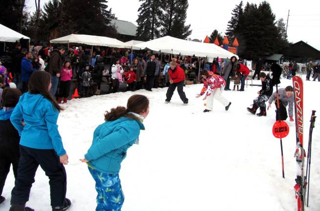 Mount Peter winter carnival raises $4,000 for Avon 2013 Breast Cancer Walk Photo by Roger Gavan The water balloon toss contest is a favorite tradition for both participants and watchers at the Mount Peter Ski Area's winter carnival.