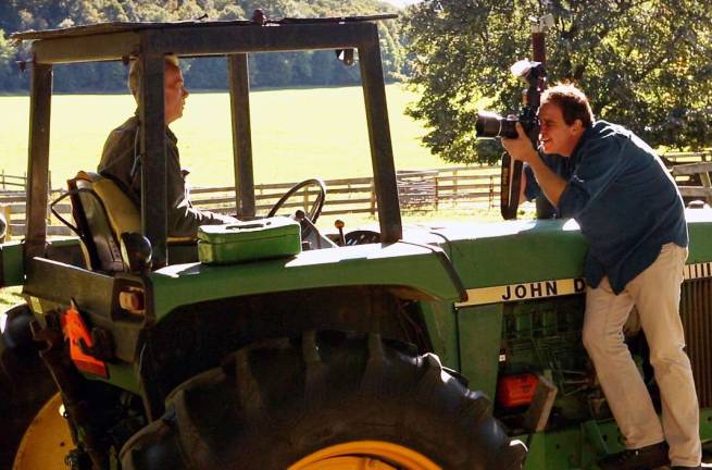 ‘Salt of the Earth’ Provided photo Photographer Robert Skinner of Warwick photographing at Clove Brook Farm in Salisbury Mills for his project documenting the farmers and farm families of Orange County who have preserved their lands with Orange County Land Trust. The project is featured on Hatchfund.org, a site where artists post their projects and people can fund them, making tax deductible contributions beginning at just $1.