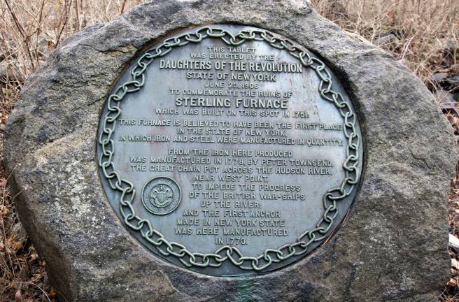 History lies waiting in the woods Photo by Robert G. Breese This tablet erected by the Daughters Of The Revolution in 1906 commemorates the ruins of the Sterling Furnace which was built in 1751 alongside Sterling Lake in the Town of Warwick.