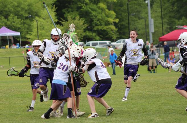 Nothing LAX-adaisical about Warwick Youth Lacrosse Photo by Marie Janiak-Hranitz U13 celebrates the win.