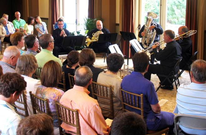 Philharmonic quintet performs for Warwick Valley Humane Society benefit Photo by Roger Gavan On Sunday, June 17, every seat was taken in the gathering room at the Warwick Grove Neighborhood Center as Principal Brass, a quintet of brass players from the New York Philharmonic, performed a benefit concert for Friends of Warwick Valley Humane Society.