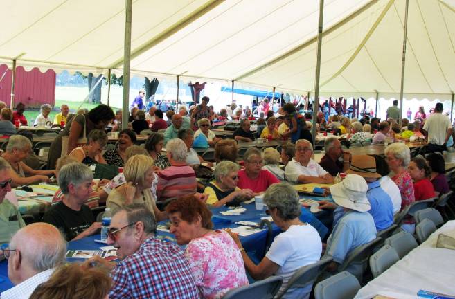 Senior barbecue draws more than 700 people Photo by Roger Gavan Tickets for the 2012 Senior BBQ were available free of charge to any senior citizen in the Town of Warwick. And after running out of the first batch of 800 tickets, the Town printed another 100 to make sure no senior would be disappointed. The traditional summer picnic is billed as a ìThank you,î for the significant contributions made by all the senior citizens of Warwick.