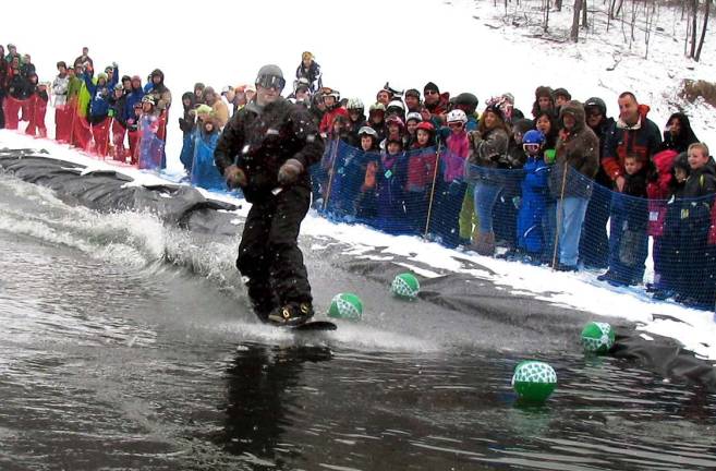 Mt. Peter holds Spring Rally and Wacky Water Skiing Contest Photo by Roger Gavan. The first participant was Kevin Hordych, a veteran of the contest, who could show everyone how it should be done.