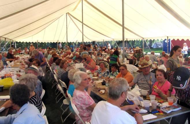 Photos by Roger Gavan Hundreds attended the annual barbecue during which Warwick says thanks for the contributions that senior citizens make throughout the town.