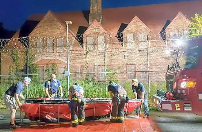 Warwick Fire Department weekly activity report Sept. 1-7 Raymond Hose Company #2 firefighters set the portable tank for water operations during a drill at Wickham Woodlands on Monday.