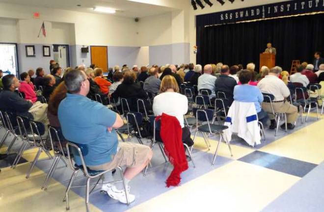 Author brings Seward to life for locals Photo by Vicki Botta More than 100 people attended a book-signing Sunday on behalf of the Seward Homestead Restoration Committee.