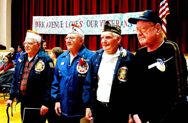 Park Ave. students salute veterans Photo by Ed Bailey Among the World War II veterans attending the Park Avenue school program saluting their service were, from left to right: Bill Bryant, Charles Papaceno, Clayton Eurich of Warwick and John Miller of West Milford, N.J.