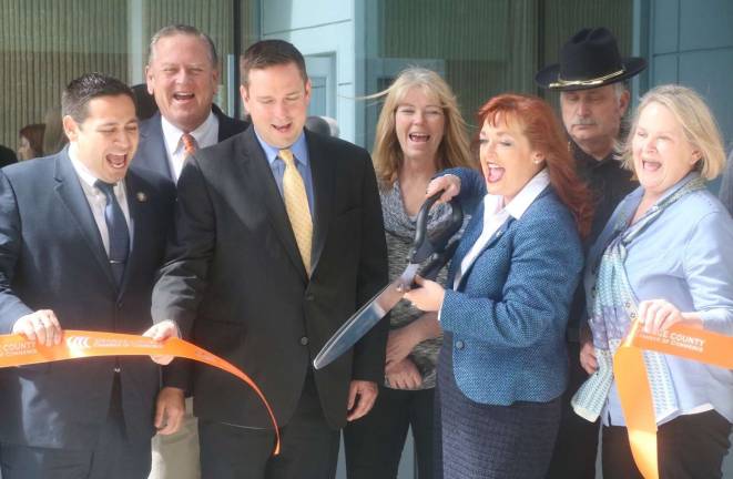 DMV offices reopen at Government Center in Goshen Provided photo Pictured from left to right: Orange County Legislators Kevindaryan Lujan and Peter Tuohy, County Executive Steven M. Neuhaus, Legislator Kathy Stegenga, County Clerk Annie Rabbitt, Sheriff Carl E. DuBois and Patricia McMullen, Deputy County Clerk, DMV, at Thursday’s ribbon-cutting to celebrate the grand re-opening of the county’s Department of Motor Vehicles office at the Government Center in Goshen.