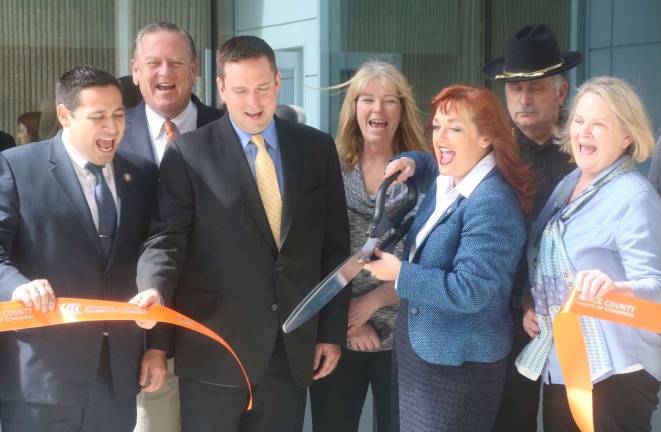 Provided photo Pictured from left to right: Orange County Legislators Kevindaryan Lujan and Peter Tuohy, County Executive Steven M. Neuhaus, Legislator Kathy Stegenga, County Clerk Annie Rabbitt, Sheriff Carl E. DuBois and Patricia McMullen, Deputy County Clerk, DMV, at Thursday&#x2019;s ribbon-cutting to celebrate the grand re-opening of the county&#x2019;s Department of Motor Vehicles office at the Government Center in Goshen.