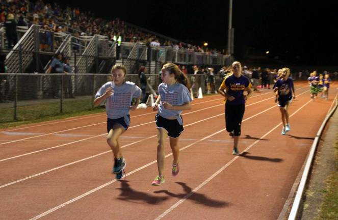 Under the lights Siobhan Kelly came in fourth overall with a time of 3:00 minutes.