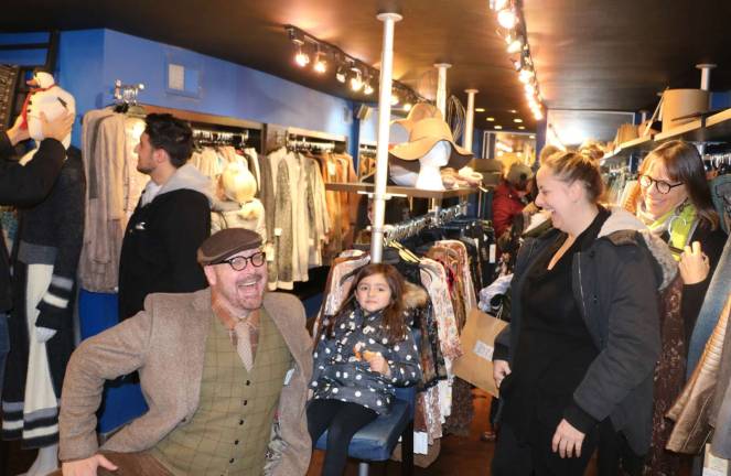 Small Business Saturday lures more shoppers to downtown Warwick Tim Mullally, co-owner of Style Counsel and Blue fashion shops, praised Small Business Saturday. Mullally, who is also an actor, enjoys clowning for the camera and entertaining his customers.