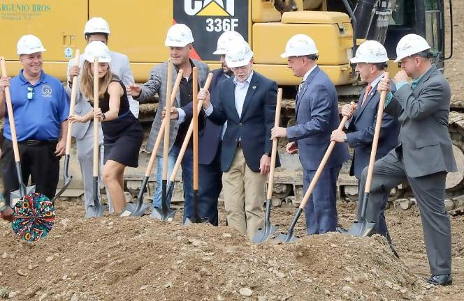 Ceremonial groundbreaking: From left: Assemblyman Karl Brabenec, Governor’s Region Representative Pavan Naidu, GTI VP Rebecca Brown, Hudson Valley Building and Construction Trades Council President Todd Diorio, Green Thumb Founder and CEO Ben Kovier, Town of Warwick Supervisor Michael Sweeton, state Sen. Mike Martucci, Orange County Economic Development Director Bill Fioravanti and Orange County Executive Steve Neuhaus.