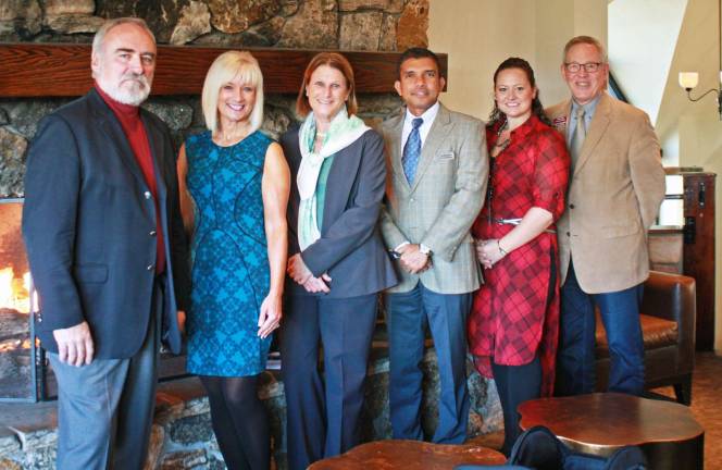 Lined up in front of the grand stone fireplace at Kites Restaurant inside Minerals Hotel to finalize details for the Warwick Valley Chamber of Commerce Holiday Mixer on Dec. 2 are Crystal Springs Area Managing Director Janis Clapoff and Director of Food &amp; Beverages Ruwan Silva (center) flanked by (left to right) Warwick Valley Chamber of Commerce Programs Committee Members John Redman, Janine Dethmers, Kristen Weiss, and Executive Director Michael Johndrow.